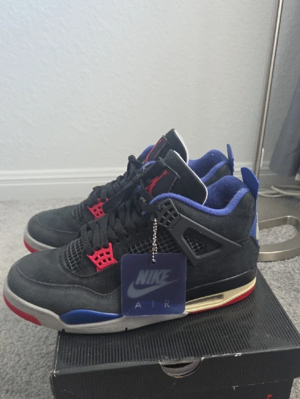 Jordan Men's Black Suede Sneakers with Red and Blue Accents